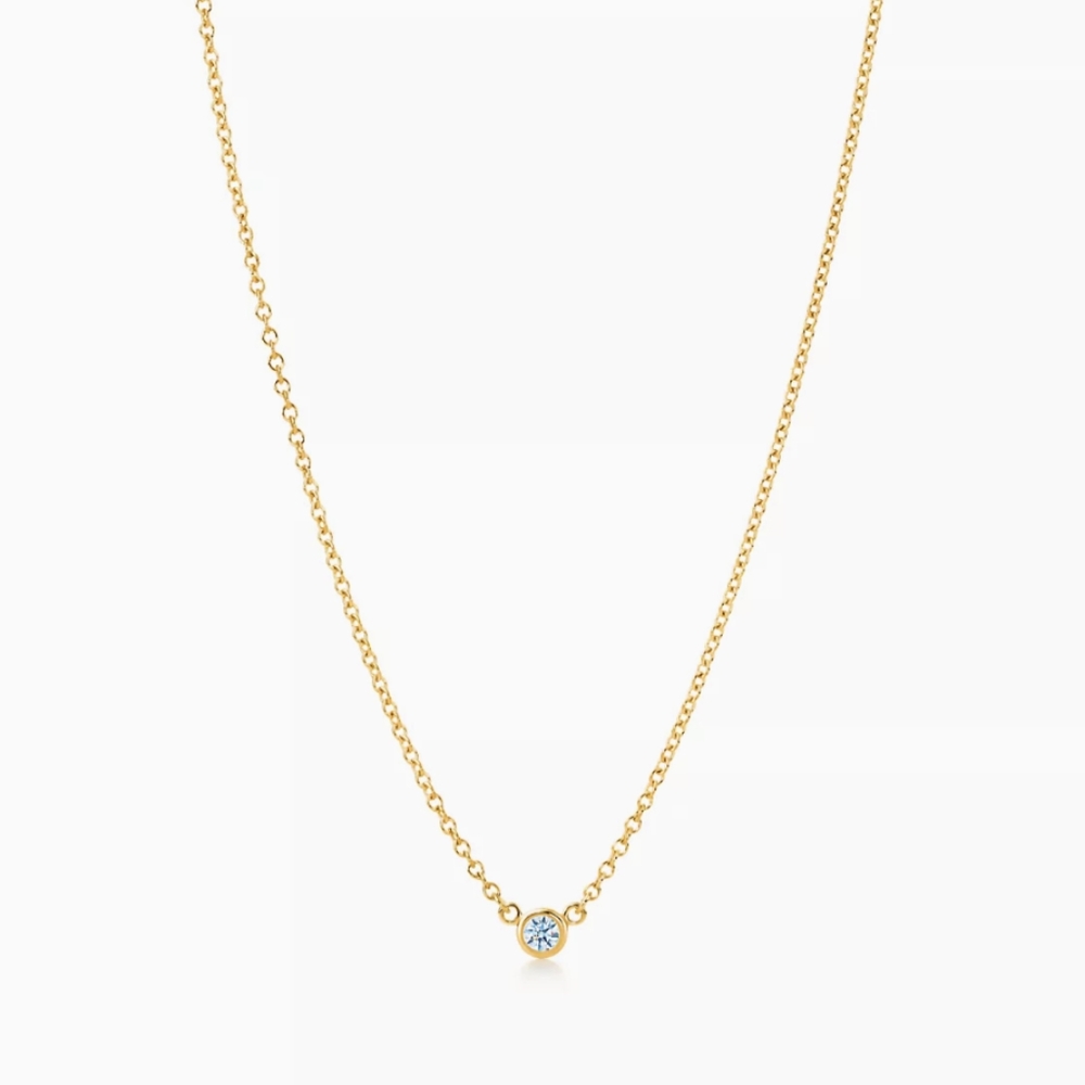 Tiffany & Co Elsa peratti 18k gold, .12k diamond pendant